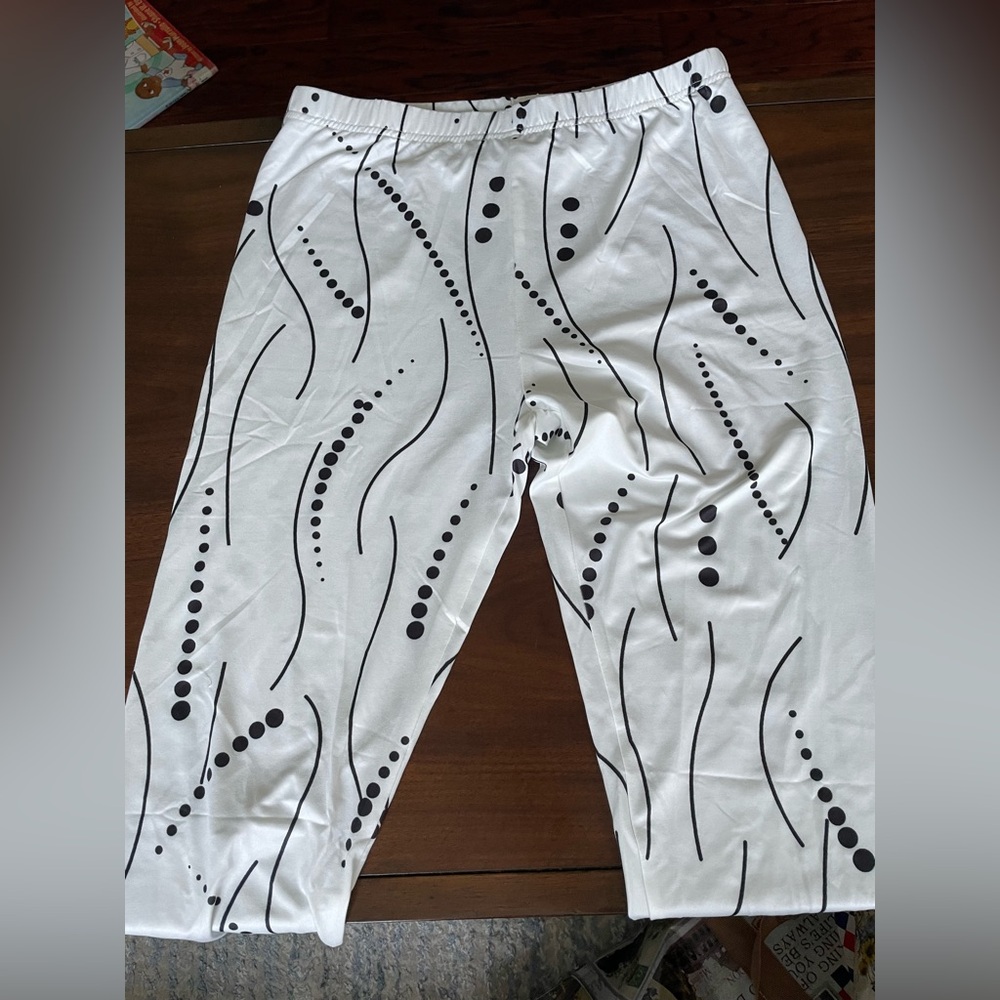 Stylish white pants with black patterned designed